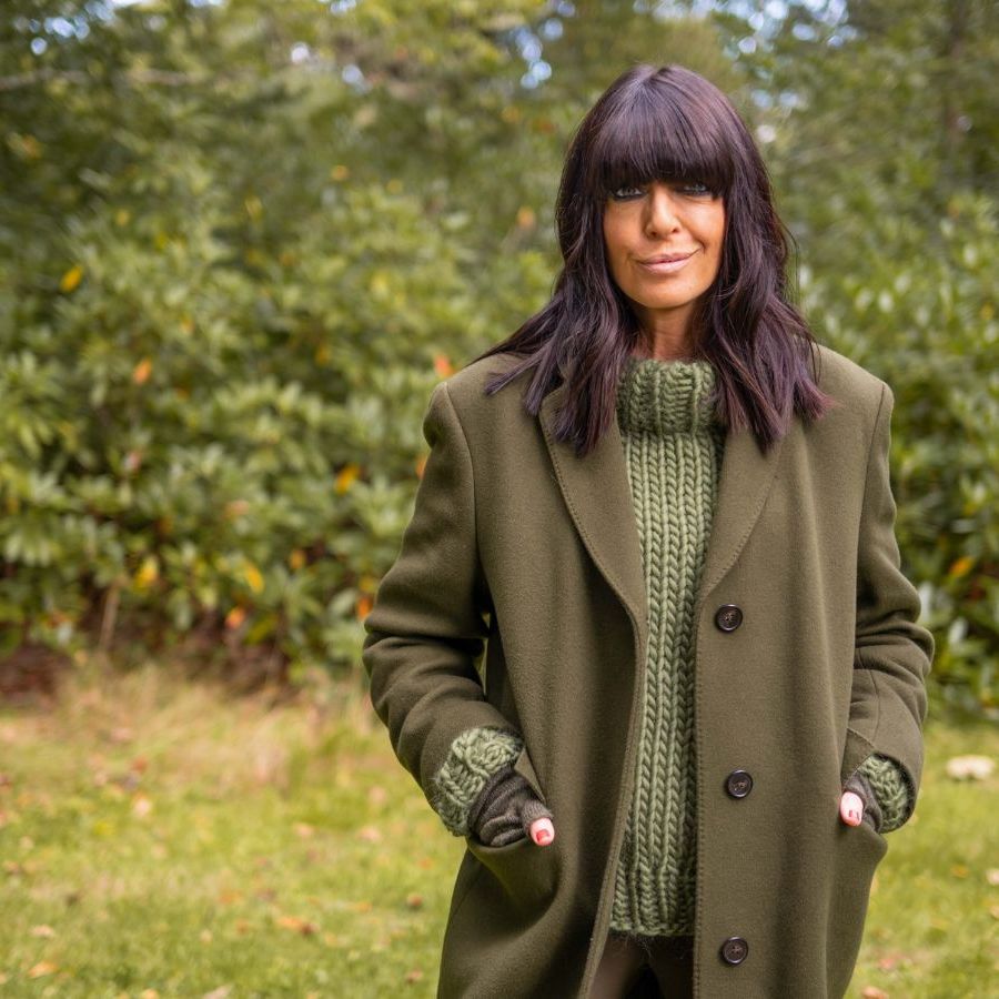 Shop Claudia Winkleman's green jumper and coat from The Traitors