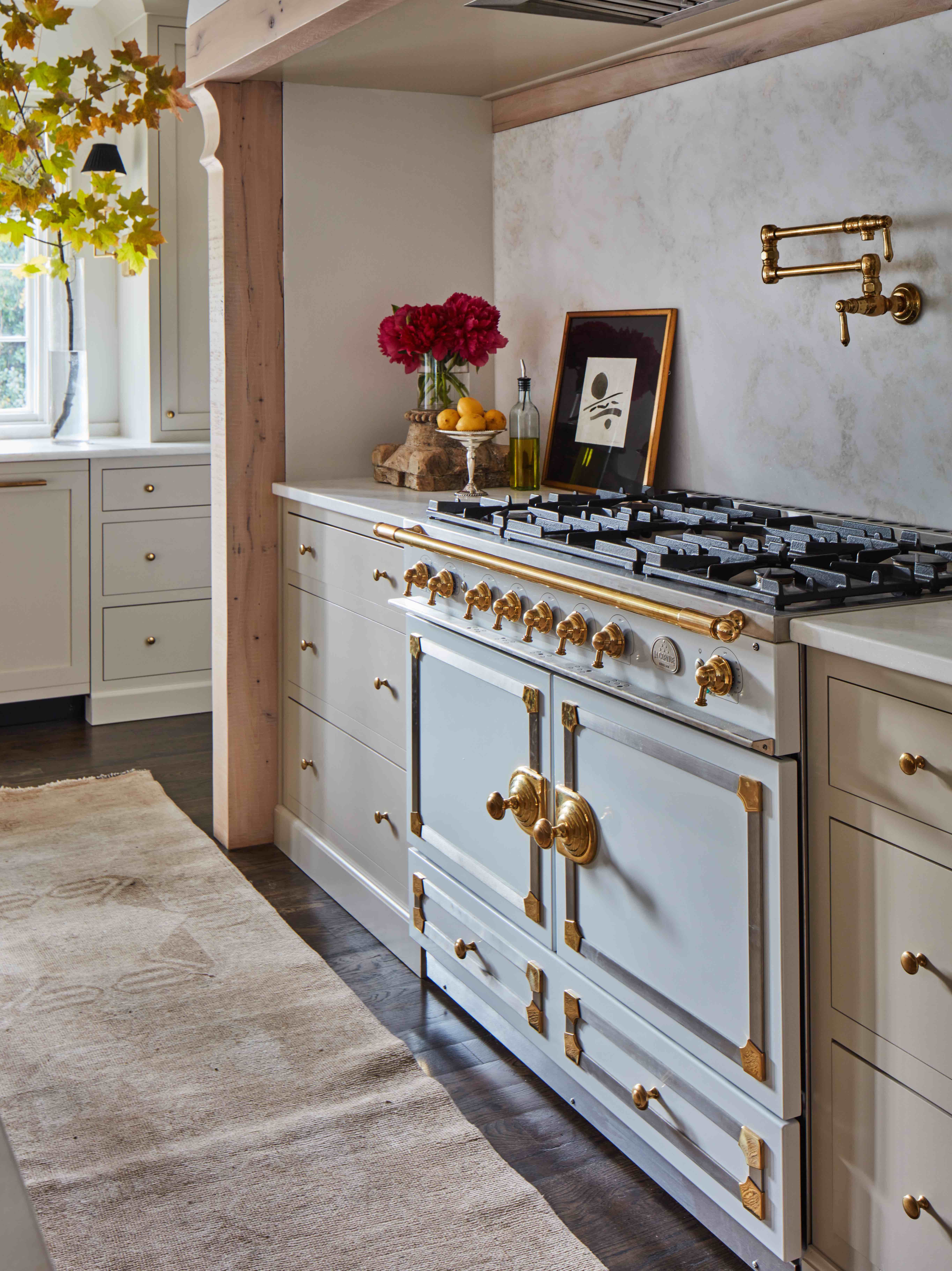 oatmeal kitchen with traditional range cooker in white