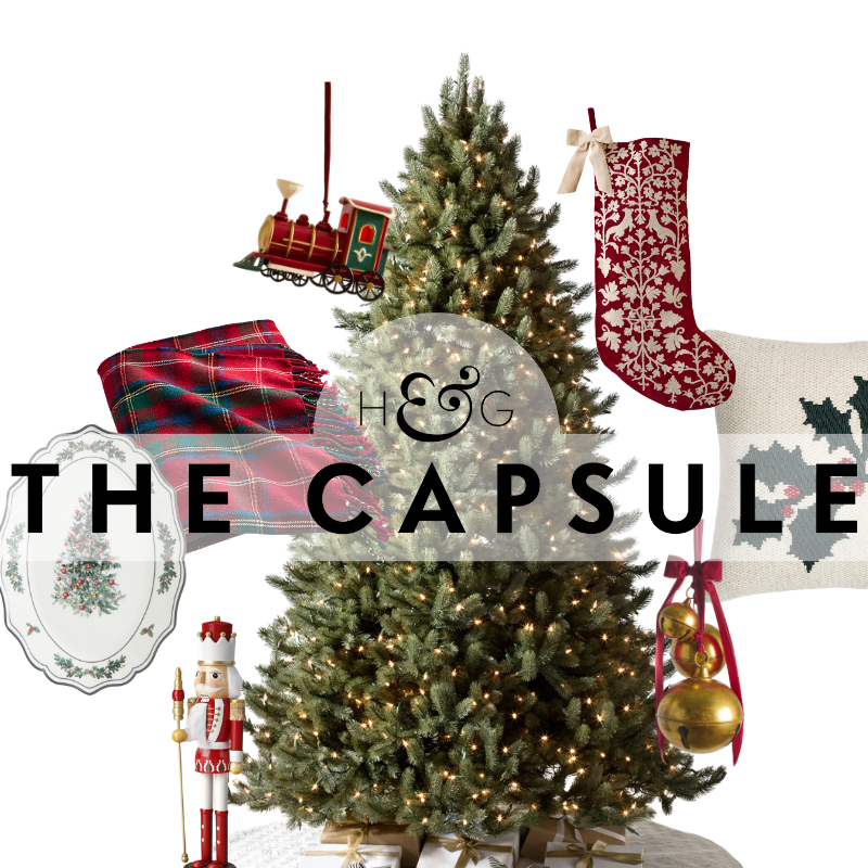 an assortment of Christmas decor around a tall Christmas tree