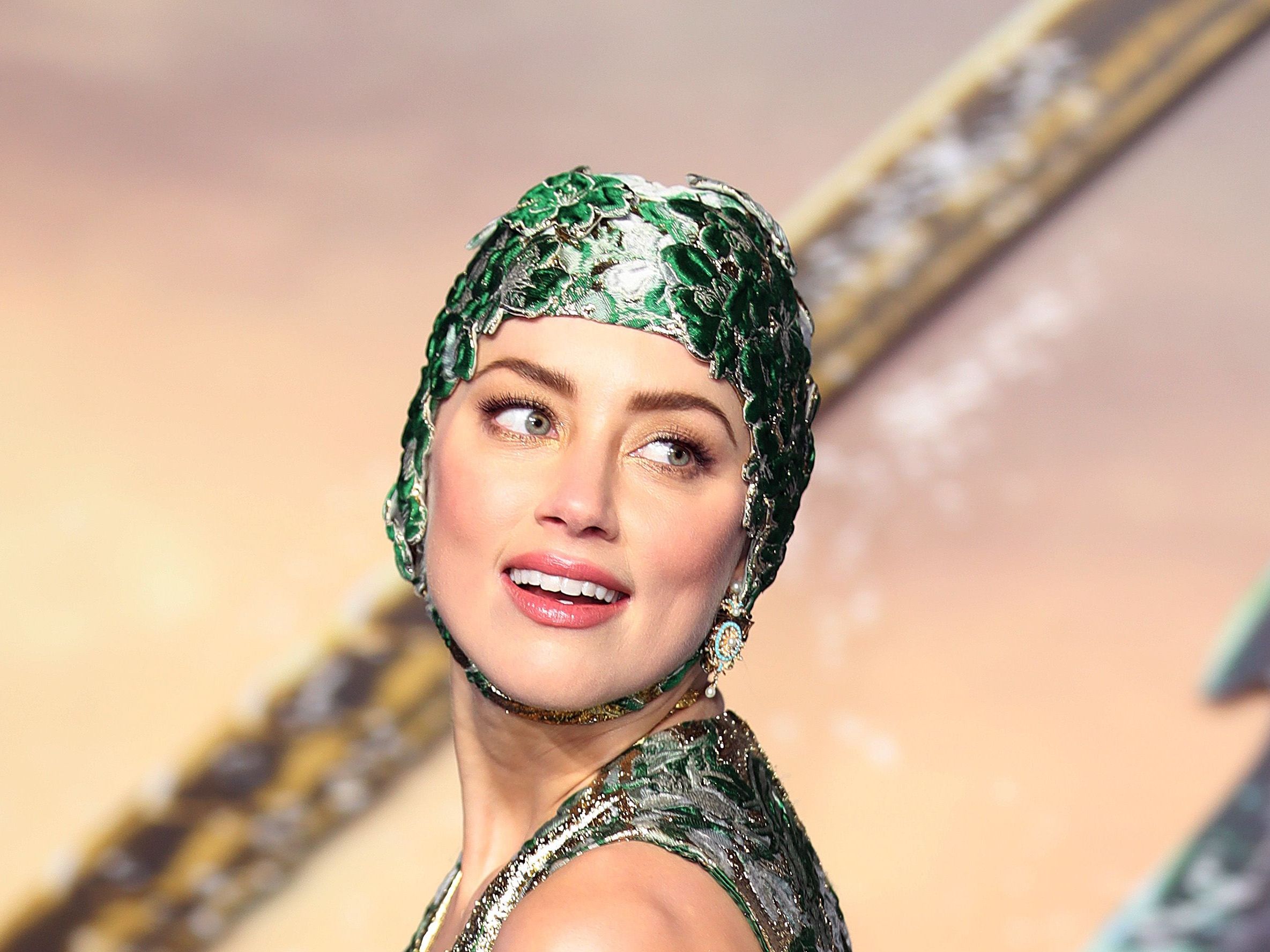 Amber Heard Wears Swim Cap With Valentino Gown at Aquaman's London Premiere  | Marie Claire
