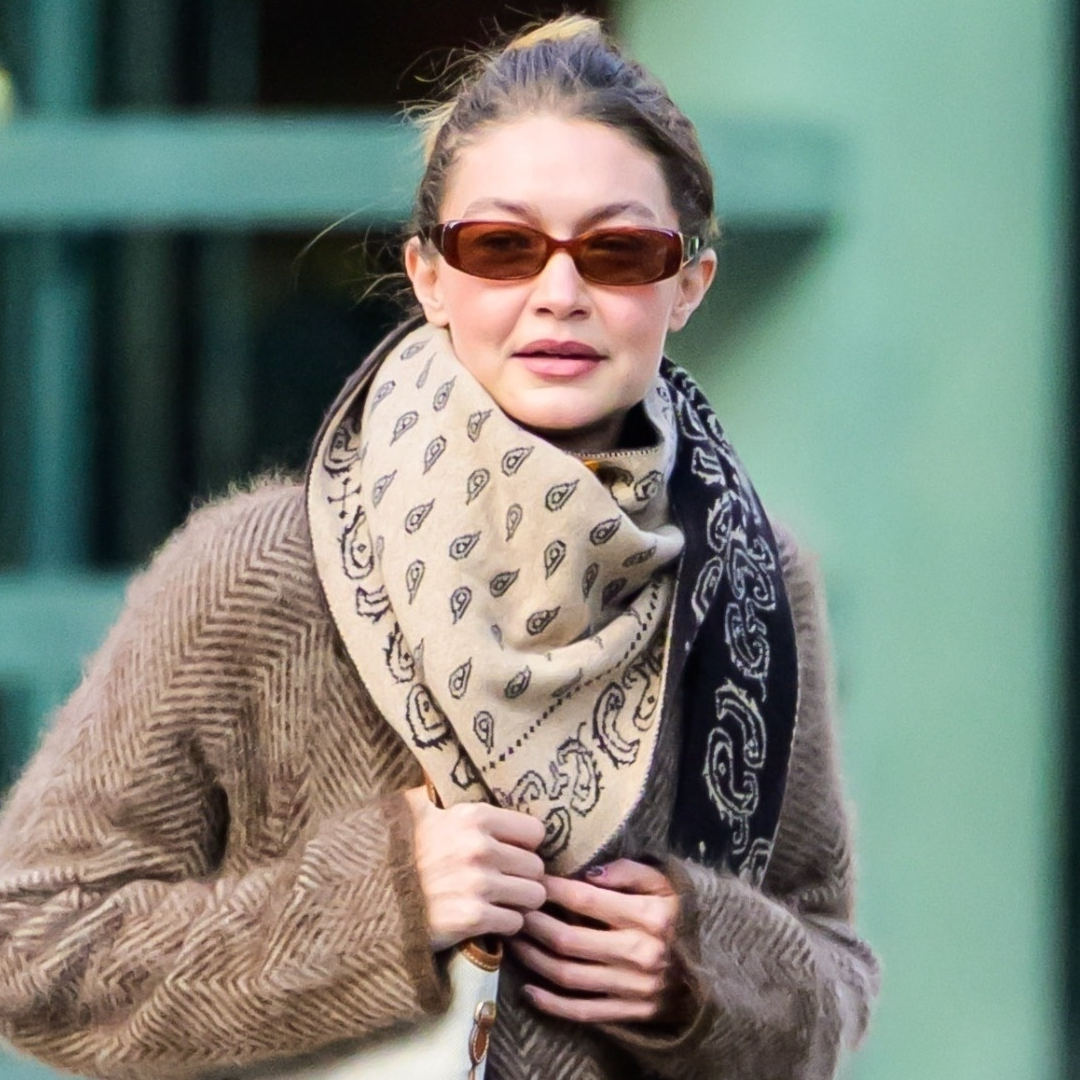 Gigi Hadid's Shearling Slippers Turn a Miu Miu Canvas Tote Into a