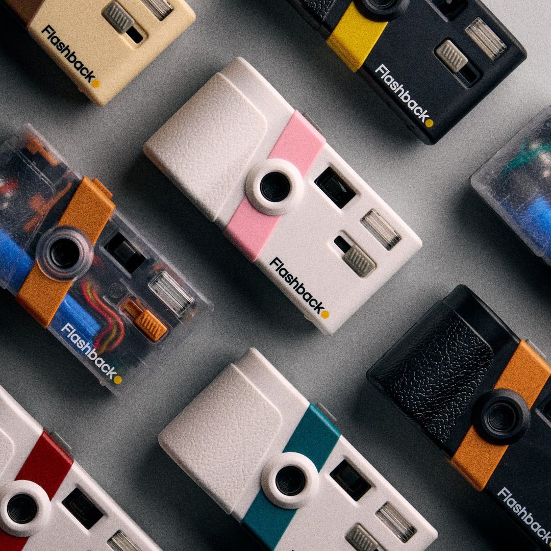 This compact camera looks like a disposable film cam, but the