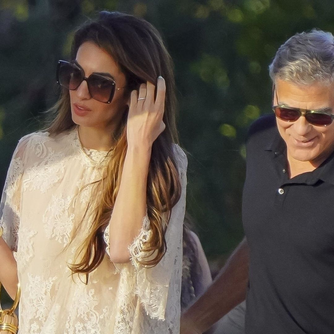 amal clooney stuns in boho-glamorous vacation dress during saint-tropez getaway Amal Clooney Sunbathes in Micro-Jorts, a Boho-Chic Bracelet Bag, and  Controversial Shoes in Saint Tropez
