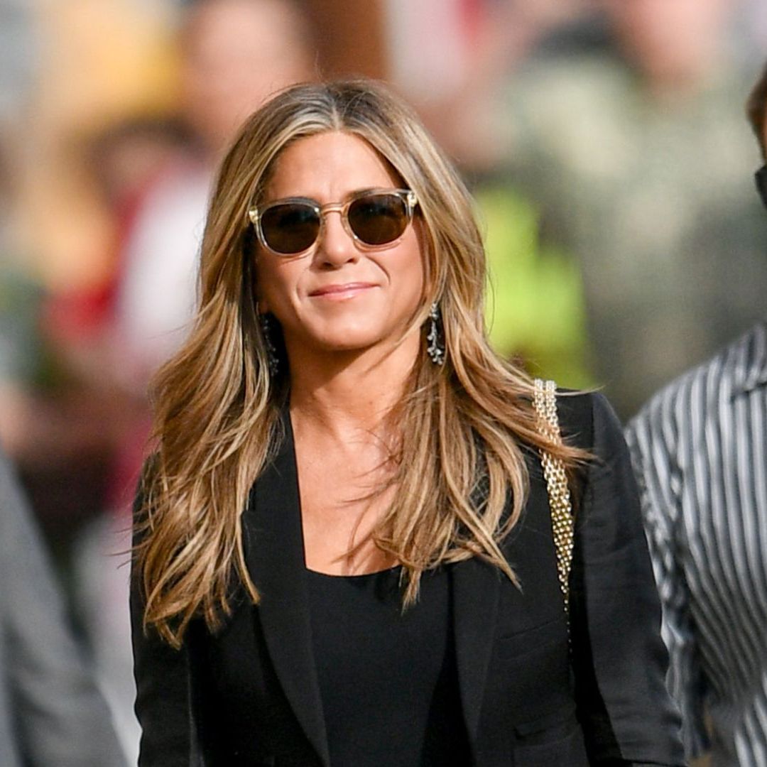 Jennifer Aniston's flared jeans and T-shirt nail casual sophistication -  and layered chains add just the right amount of edge | Woman & Home