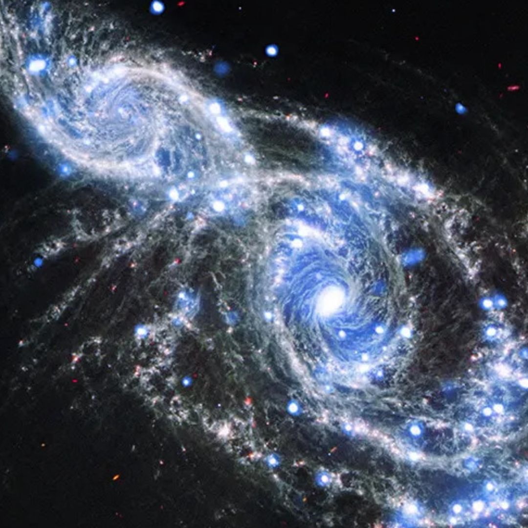 Space telescopes capture breathtaking galactic hug photo of the
