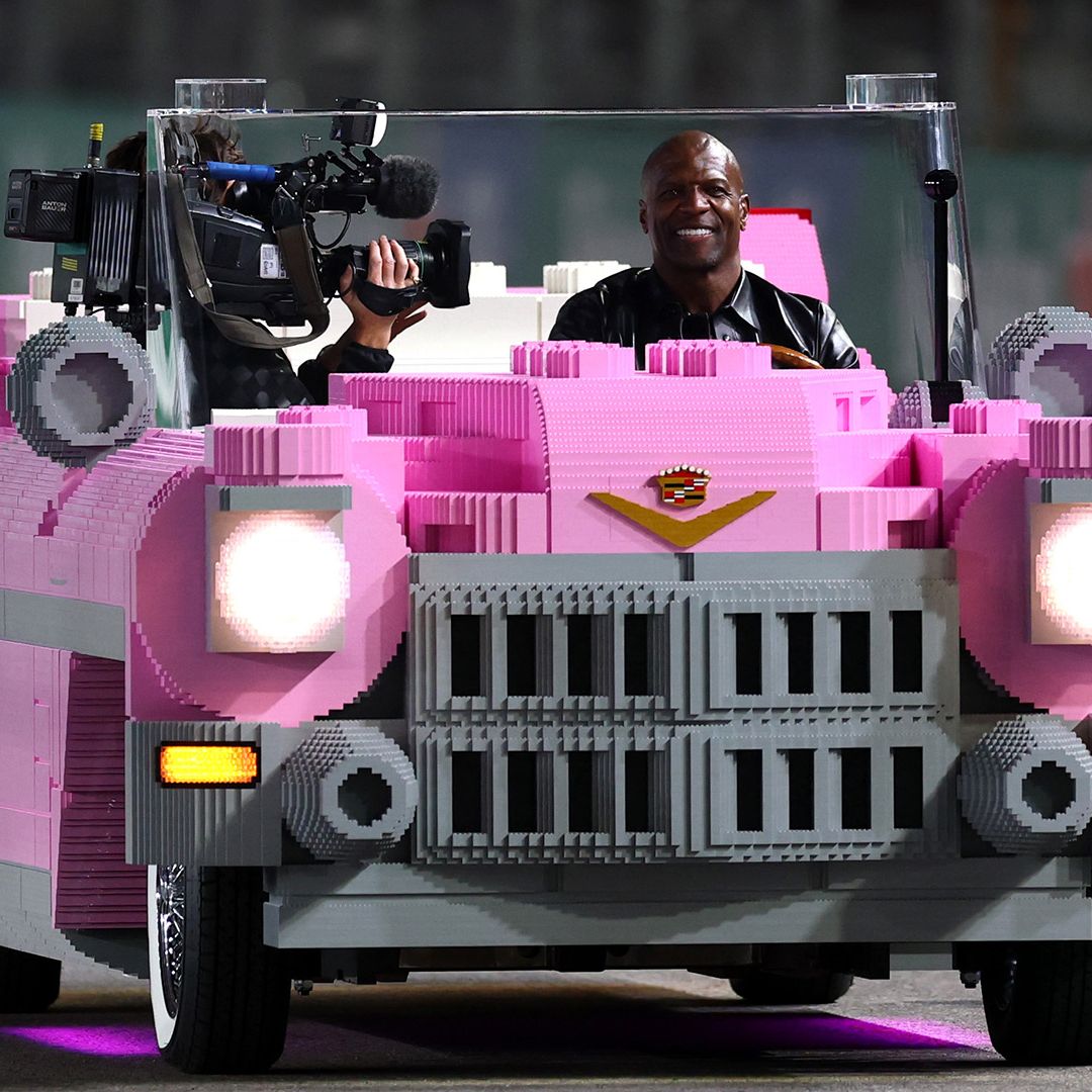 Terry Crews driving a full-size Lego 1950s pink Cadillac is the