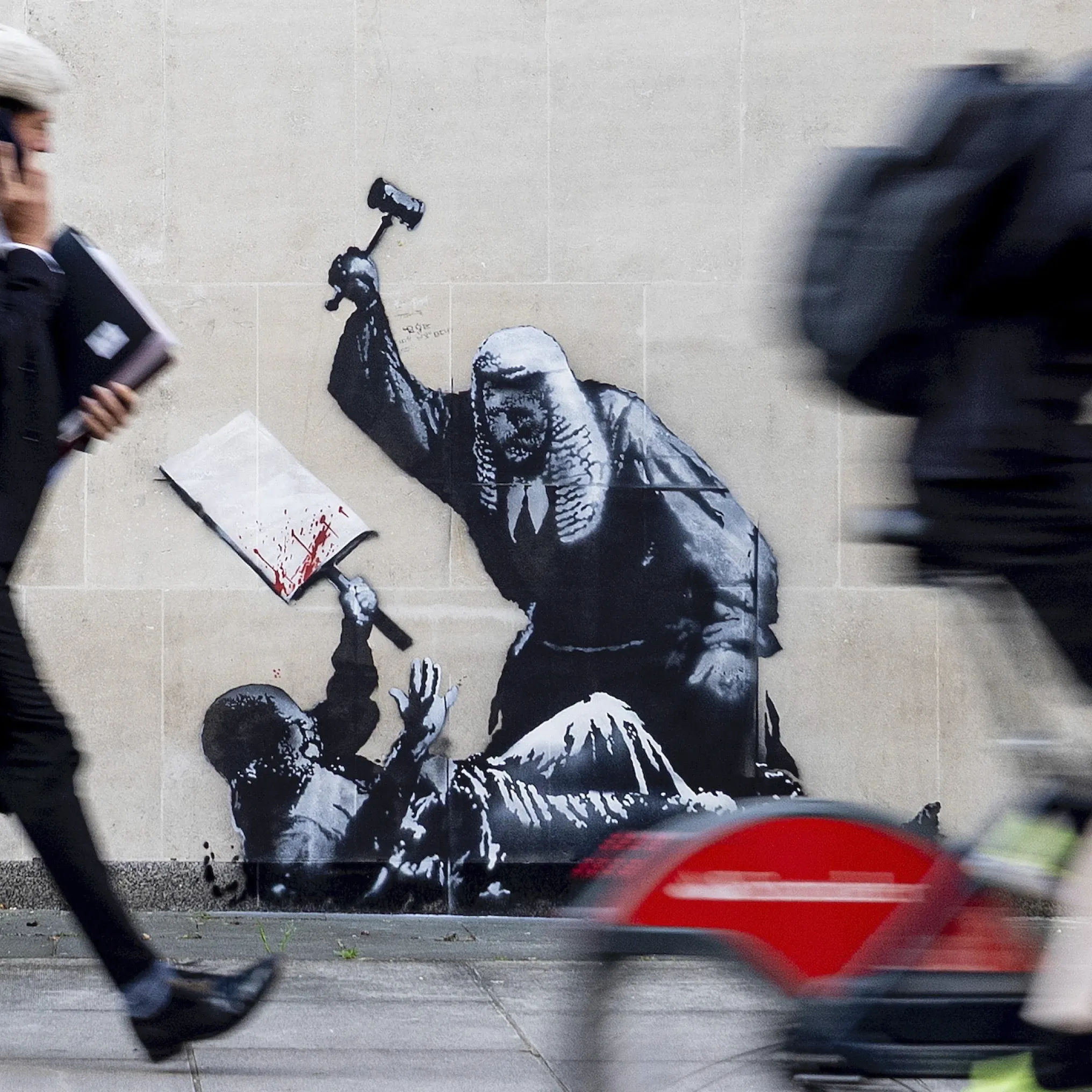 Banksy spray paints the Royal Courts of Justice – and it's already