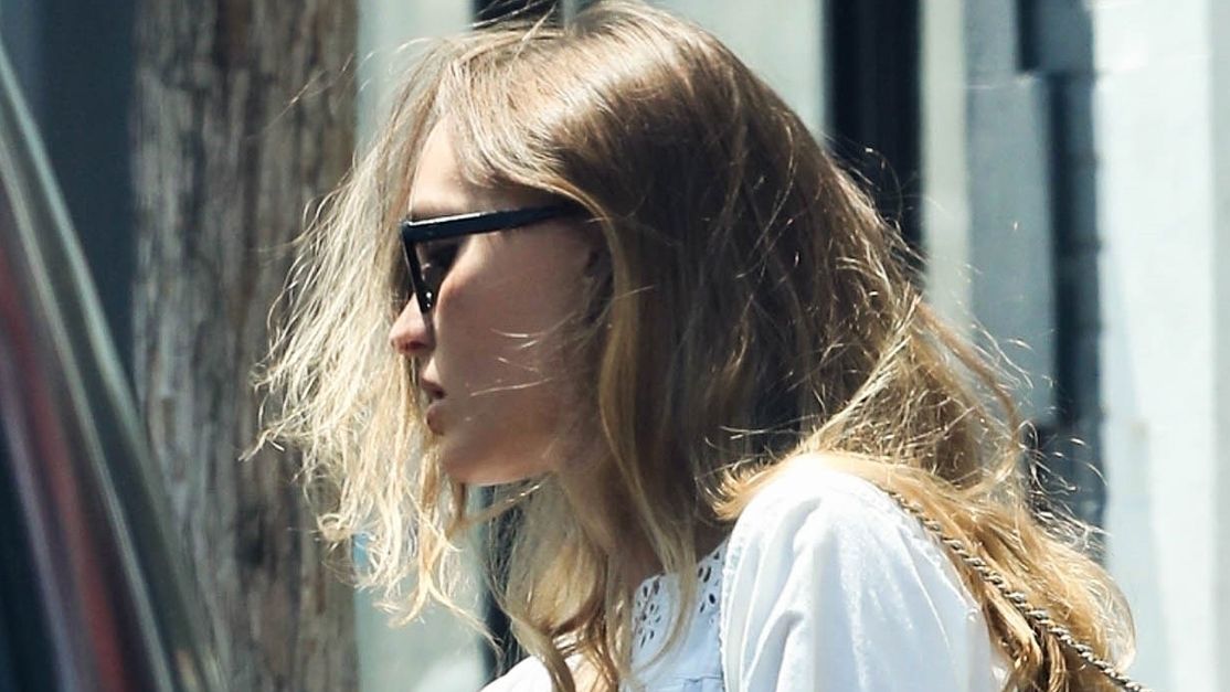 lily rose depp white mini dress Lily-Rose gracefully wearing a white mini dress leaves a CVS pharmacy in Studio City (L.A.)