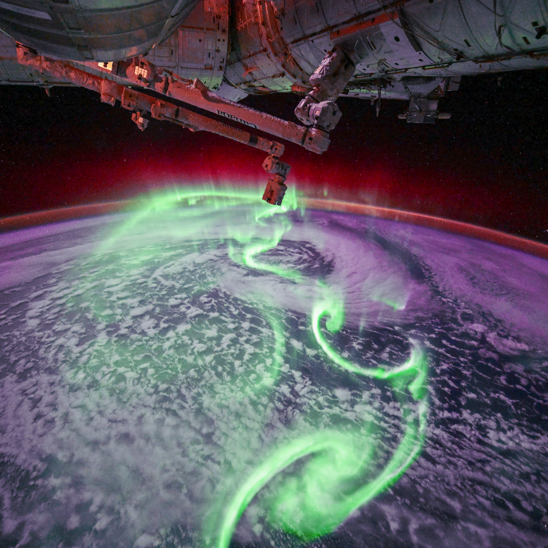 Neon green auroras from space will take your breath away photo of