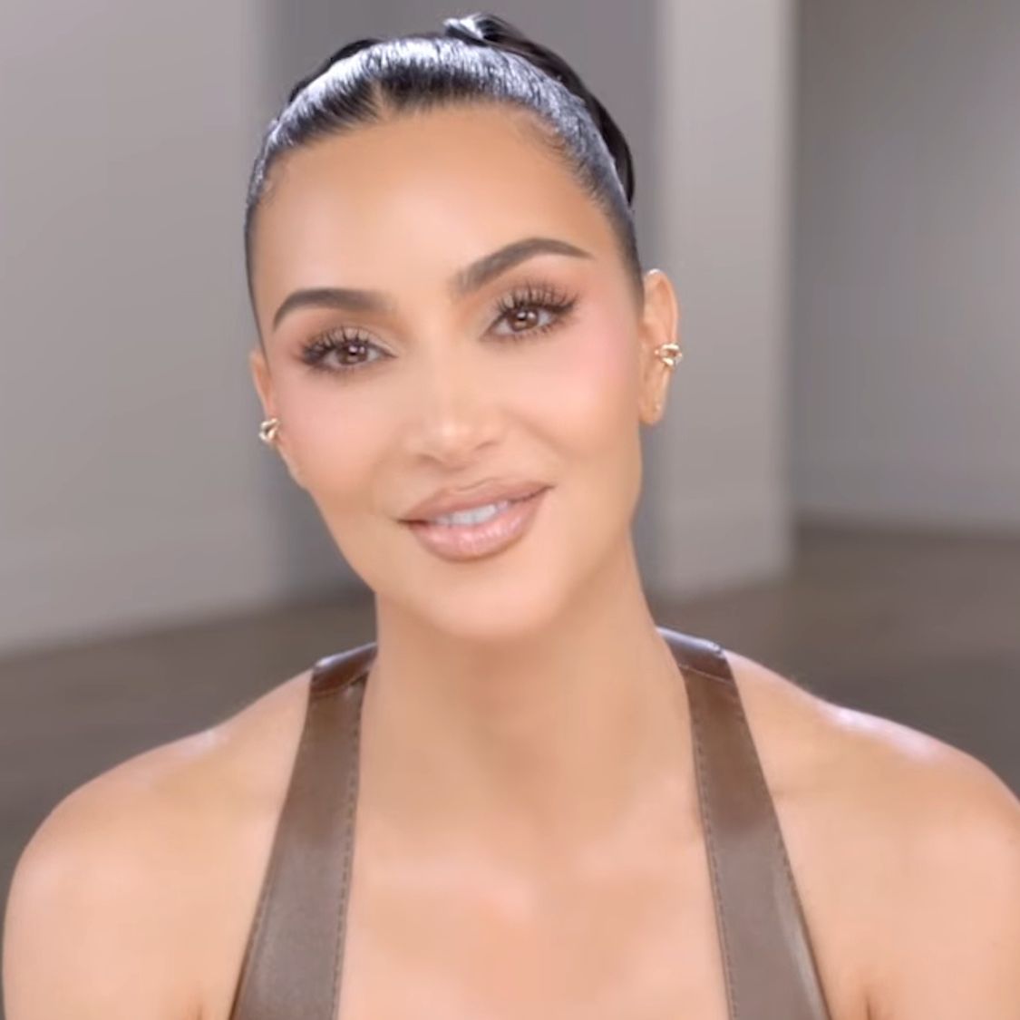Kim Kardashian Wore A Bunch Of Brown Leather To A SKIMS Event, And The Look Has Me FALLing In Love