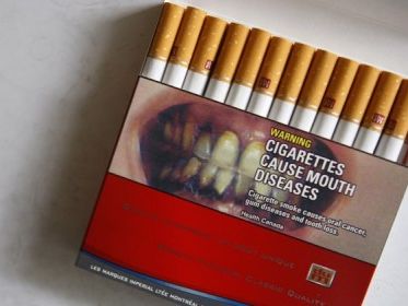 2 packs of cigarettes a week Gruesome cigarette warnings: A global timeline