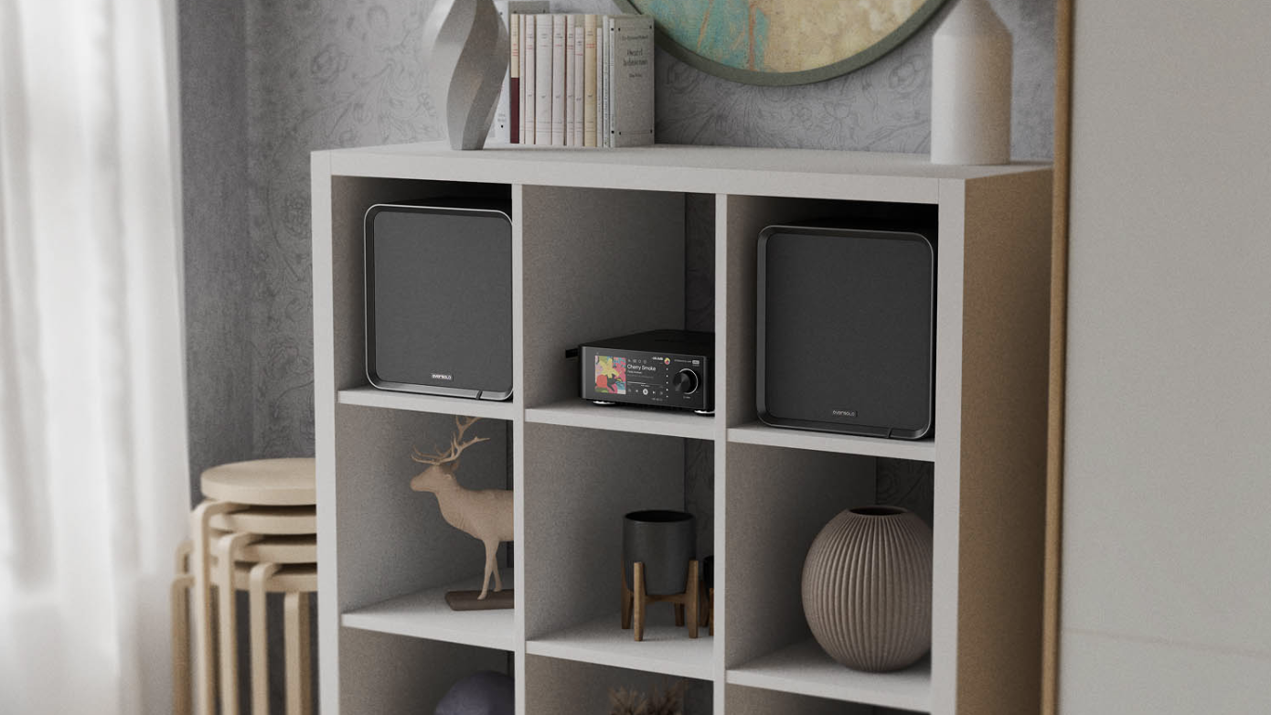 Eversolo SE100 on an IKEA Kallax shelving system, with grilles on the speakers