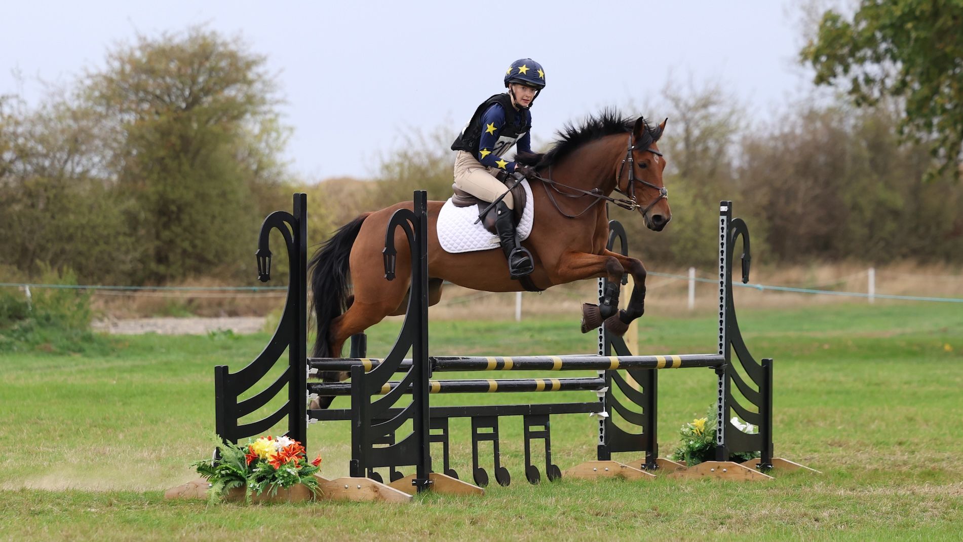 Megan Horbury and Jack Rabbit jumping black and yellow showjump at British Riding Club Combined Championships 2026 at Aston-le-Walls