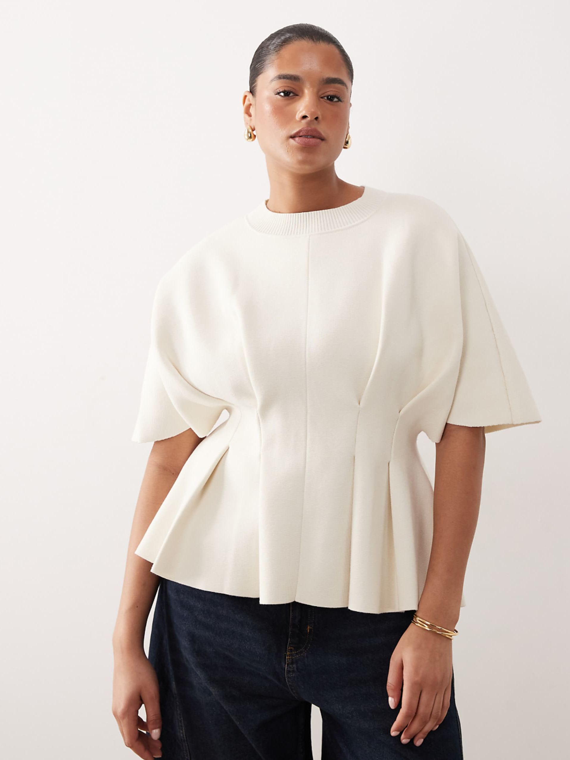 Arrange Curve Compact Knit Peplum Top in Oyster