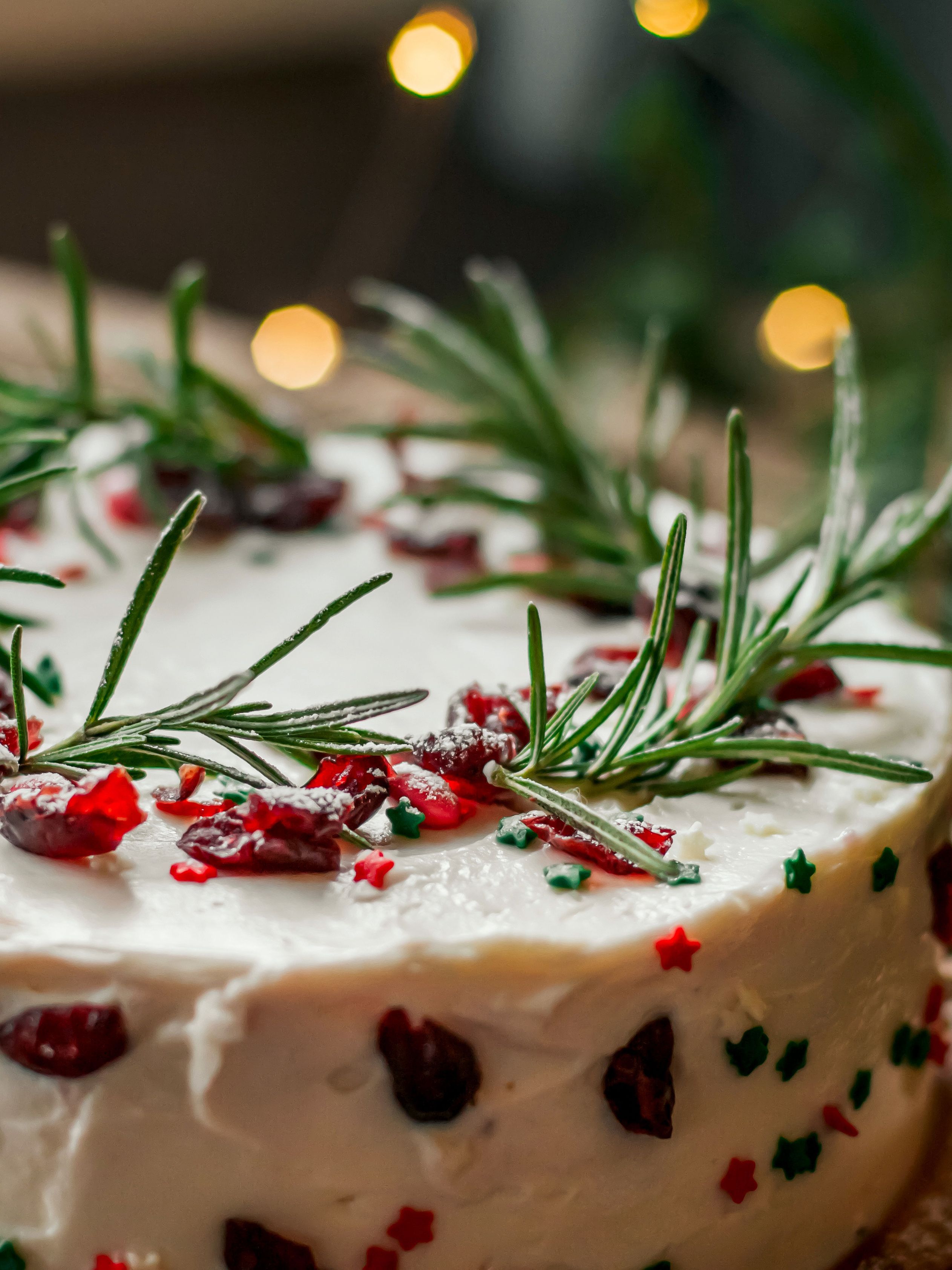 festive cake with rosemary decor