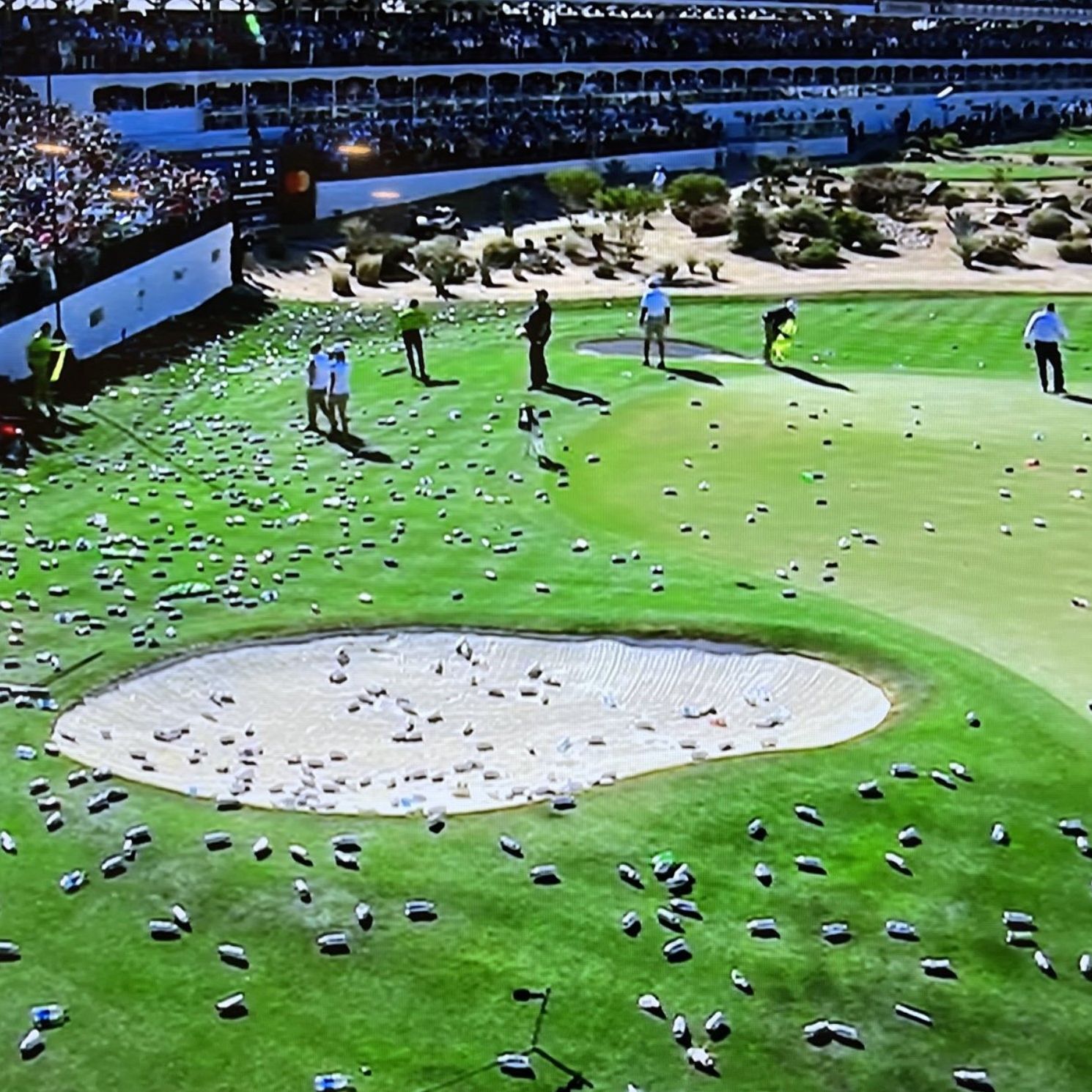 WATCH: Scottsdale Fans Cover 16th Green In Beer Cans After Hole-In