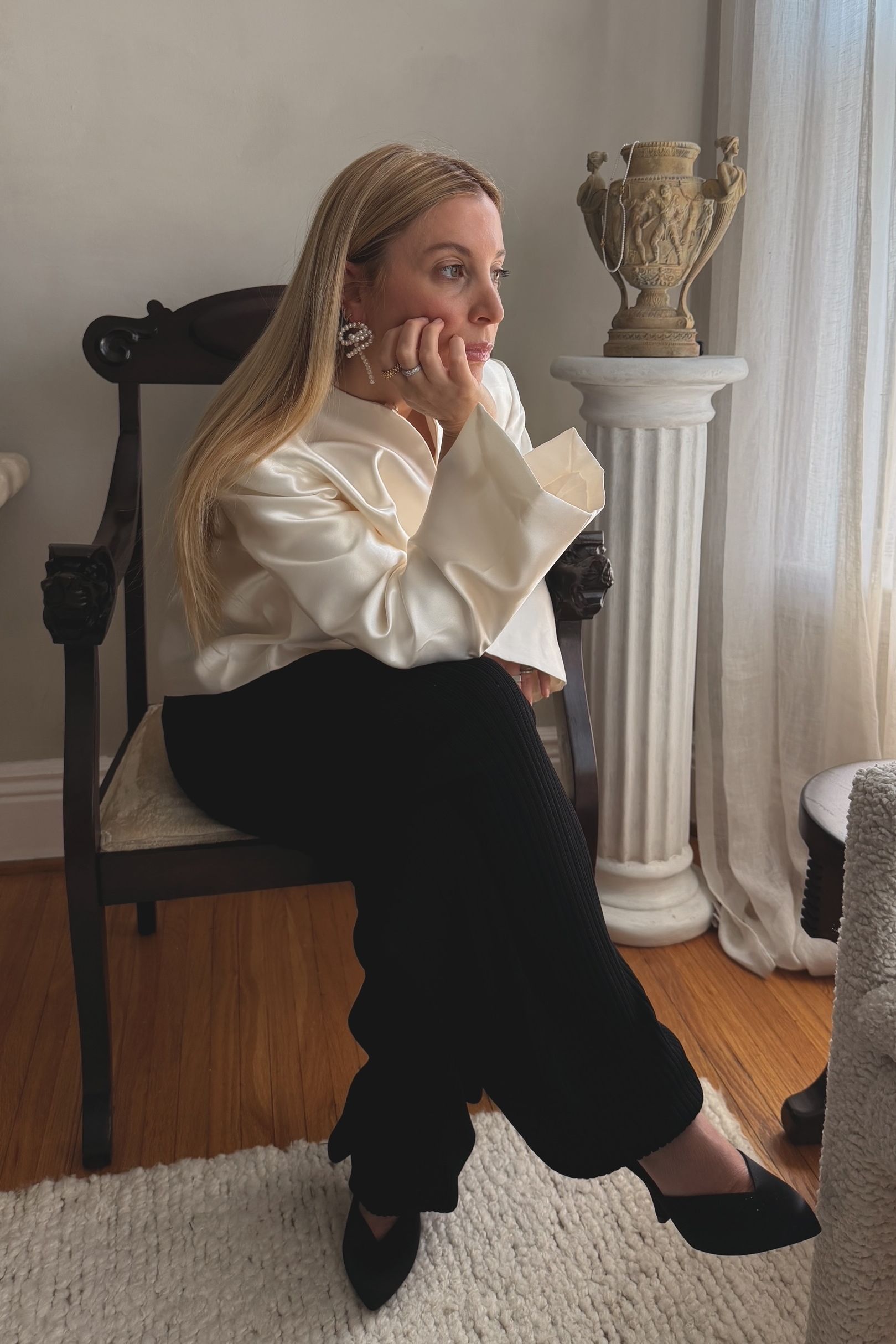 Kerry Pieri wears COMPLETEDWORKS statement earrings