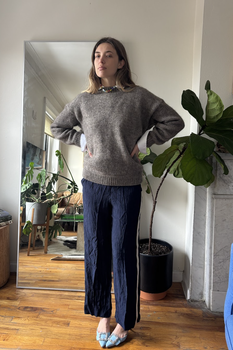 Aemilia Madden wearing track pants and a sweater