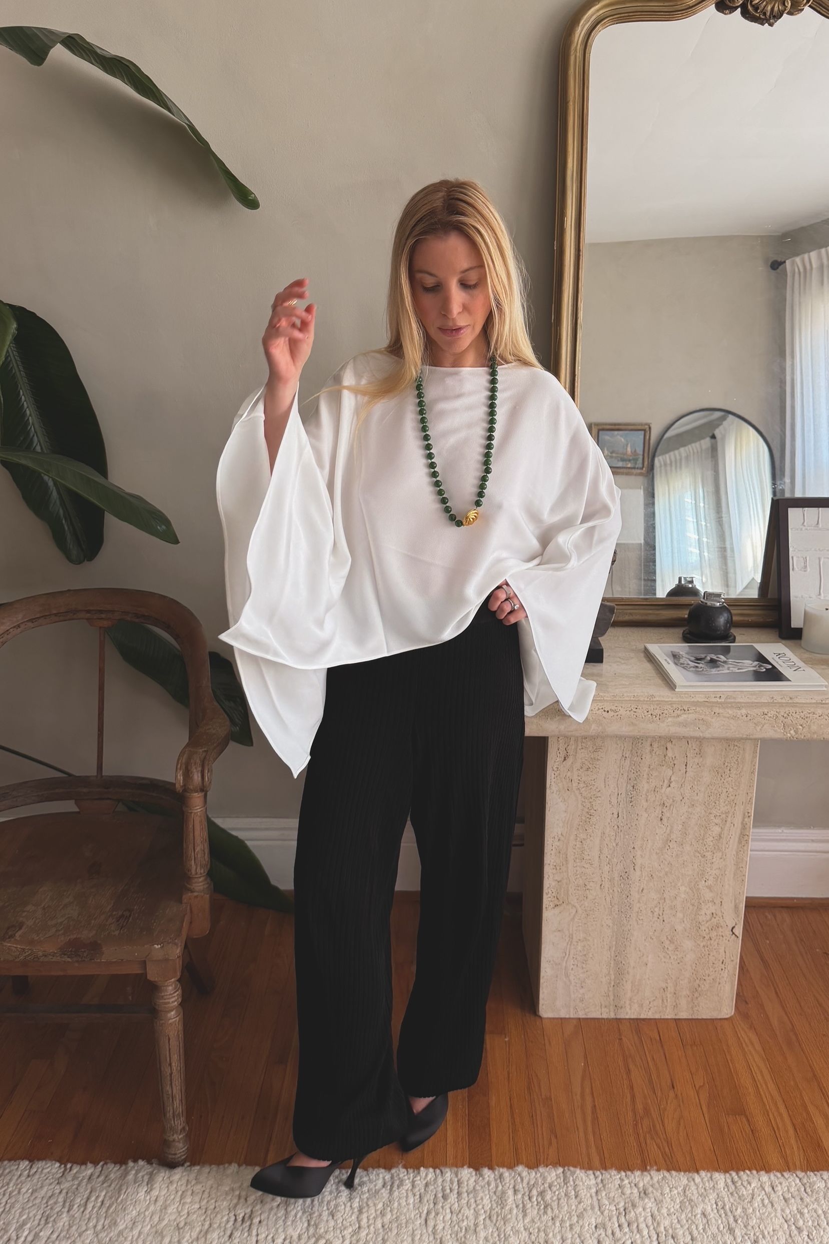 Kerry Pieri styles a green Julietta necklace with a black and white look