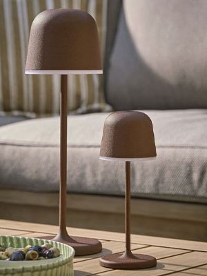 pair of rust coloured rechargeable outdoor table lamps