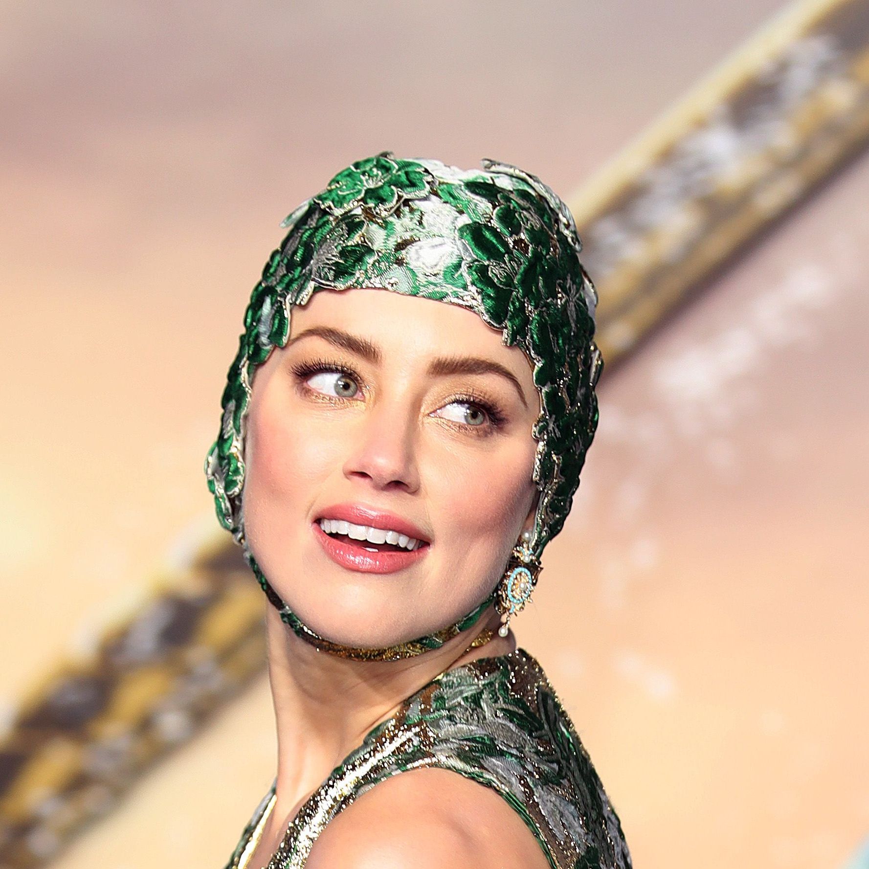 amber heard green dress Amber Heard Wears Swim Cap With Valentino Gown at Aquaman's London Premiere