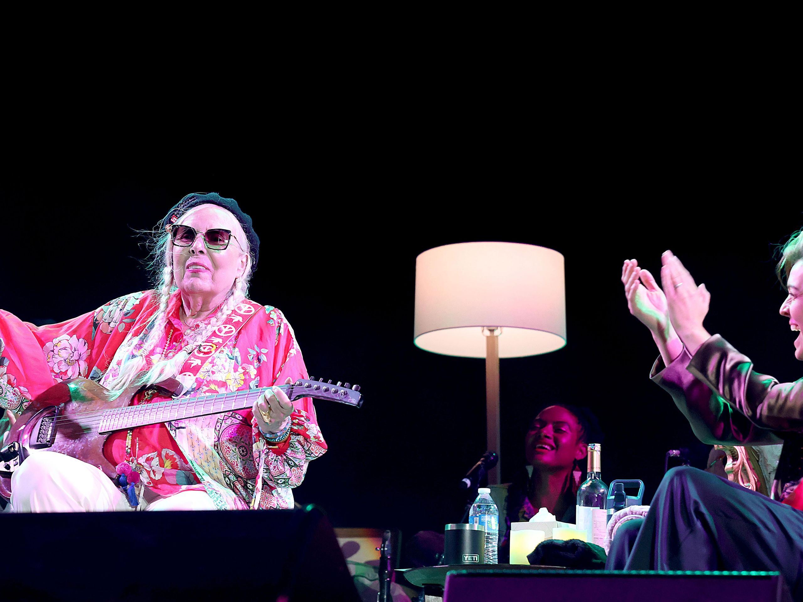 Joni Mitchell returns to the stage during a 25-song set playing a