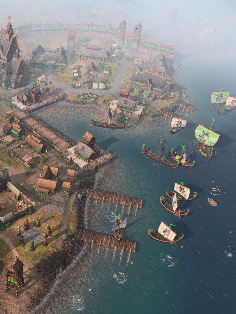 Age of Empires 4: Raiders of the North DLC - Viking fleet arriving on the shore of a beach settlment