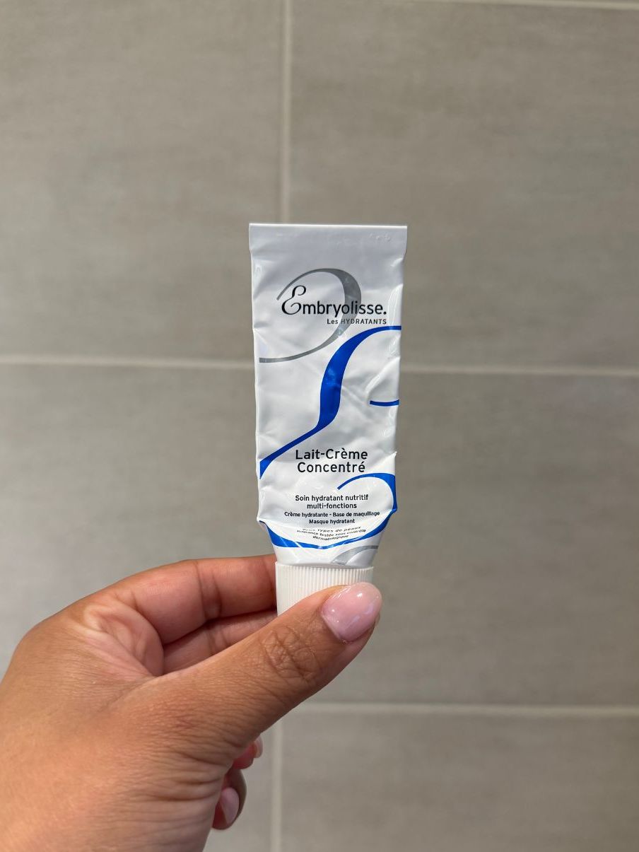 Aleesha holding empty embryolisse lait-cre&amp;#768;me concentre&amp;#769;
