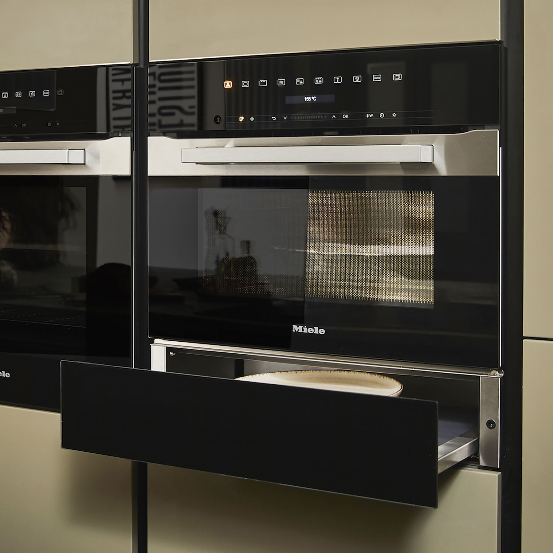Magnet olive green kitchen with miele warming drawer