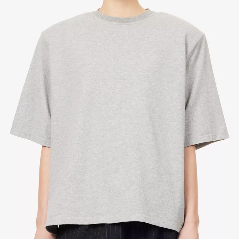 model wearing a shoulder pad top, the frankie shop