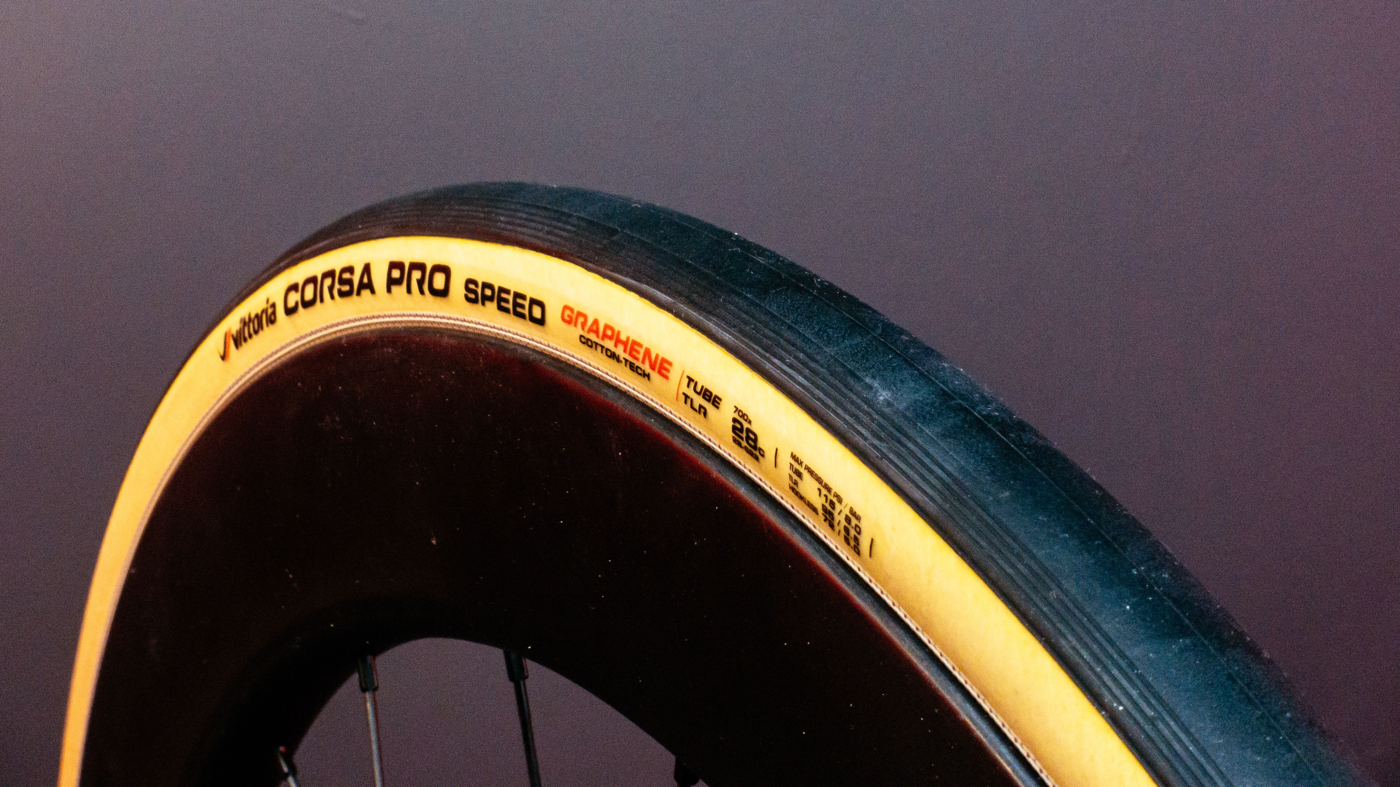 Vittoria Corsa Pro Speed road tyres with a purple studio background