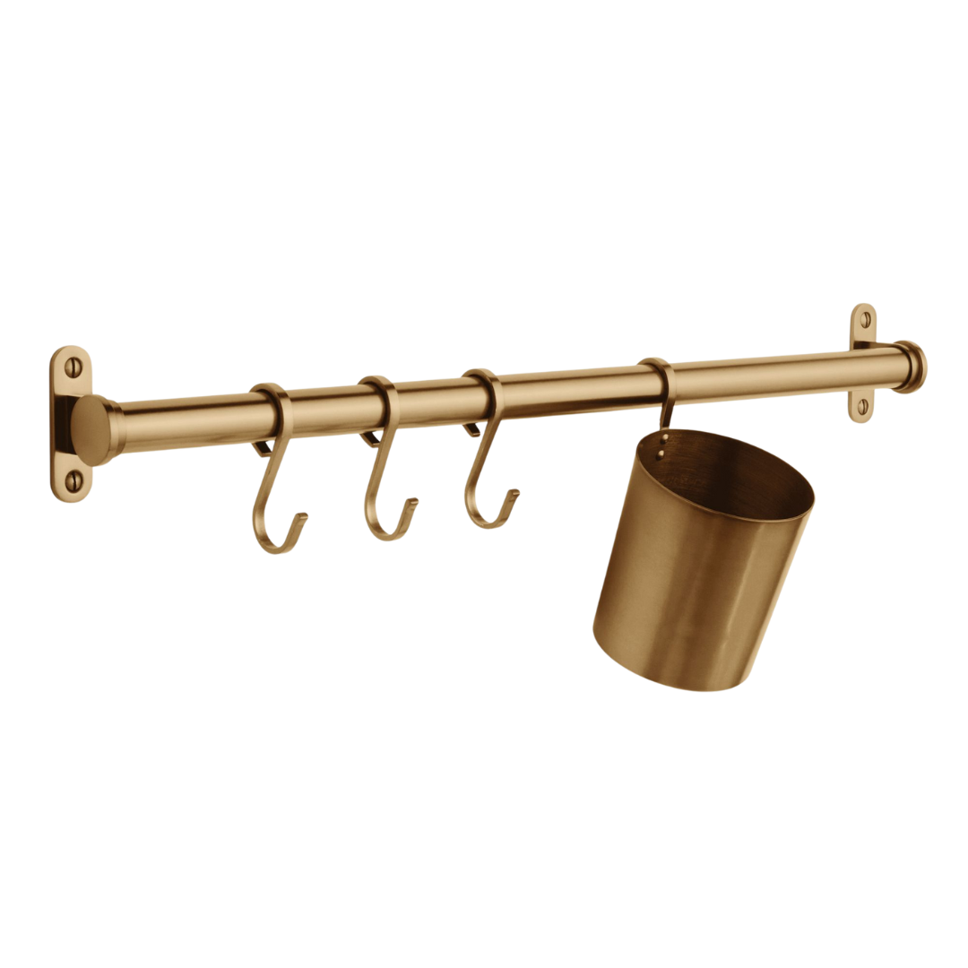 a brass pot rack