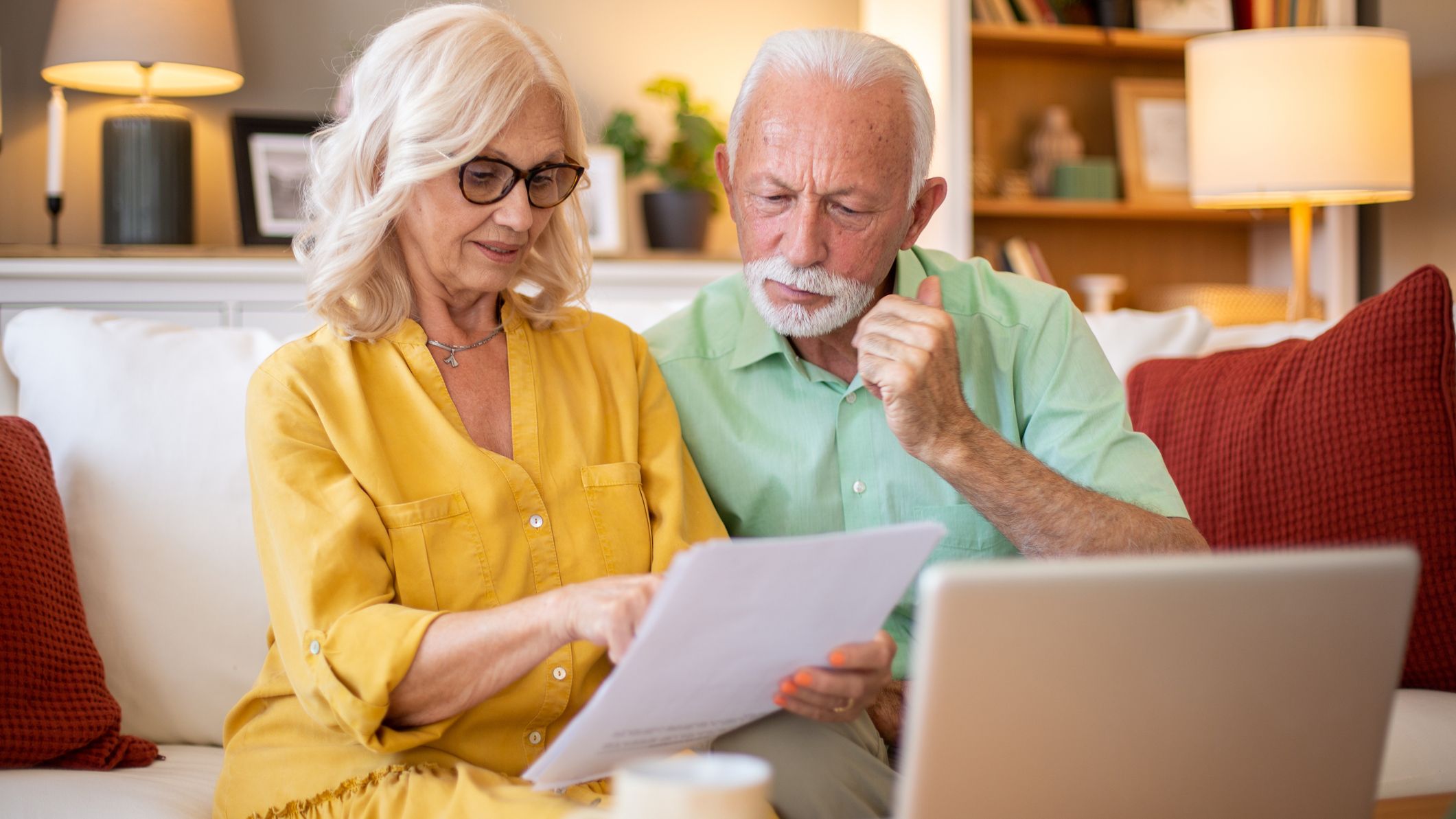 a happy couple making a financial decision