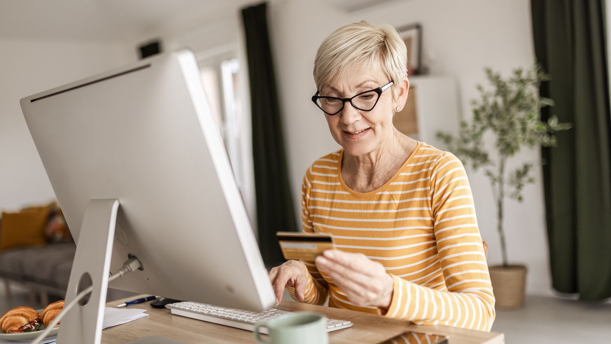 Woman Making an Online Purchase at Home