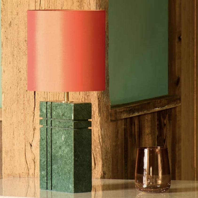 Green marble base table lamp with orange shade