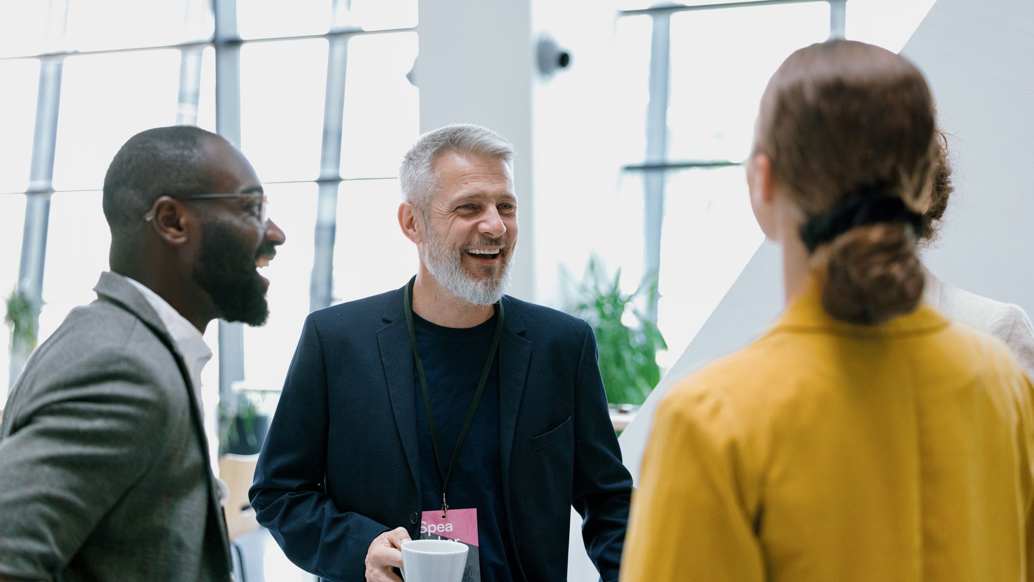 Group of Professionals Networking During a Business Event