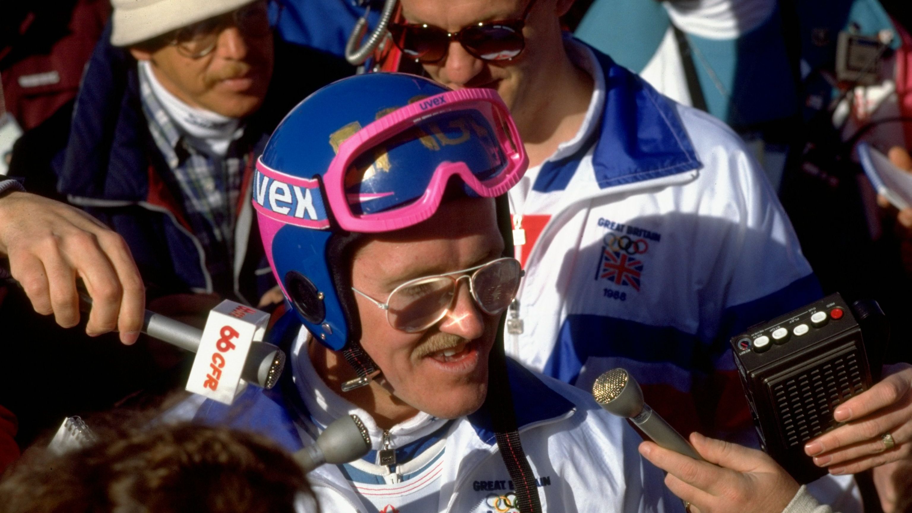 23 Feb 1988: Eddie Edwards of Great Britain is surrounded by the press after the 90 metres Ski Jump event at the 1988 Winter Olympic Games in Calgary, Canada. Edwards finished in 55th place. \ Mandatory Credit: Allsport UK /Allsport