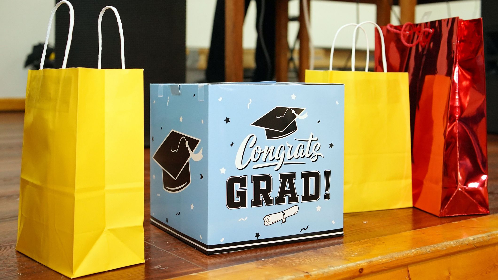 Closeup shot of colorful bags and displays to congratulate on graduation