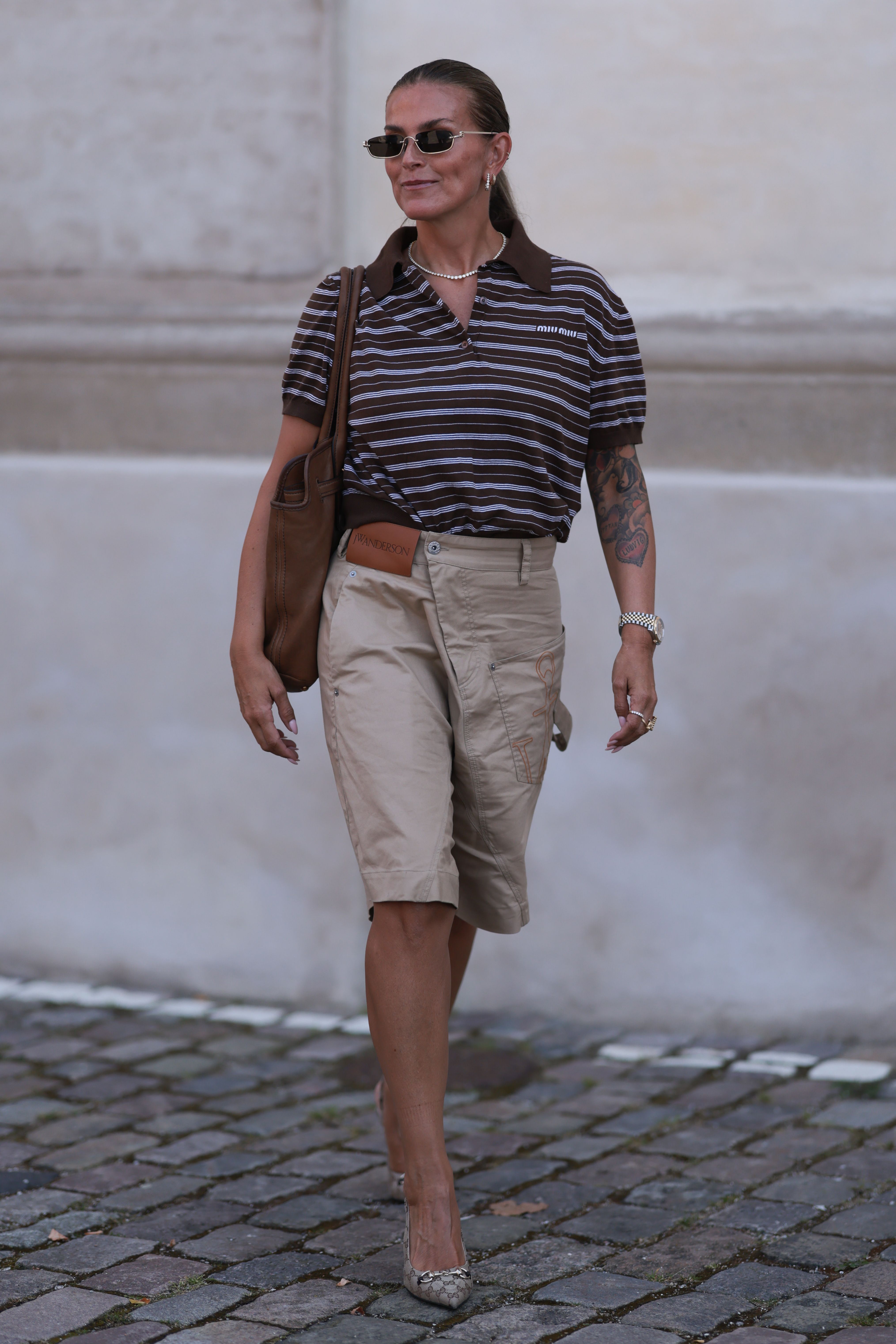 woman wearing bermuda shorts