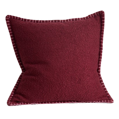 A burgundy Curtis Boucl&amp;eacute; Blanket-Stitch Pillow