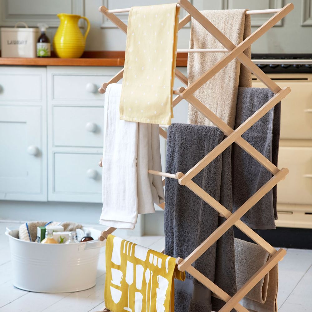 laundry room with folding wooden clothes horse