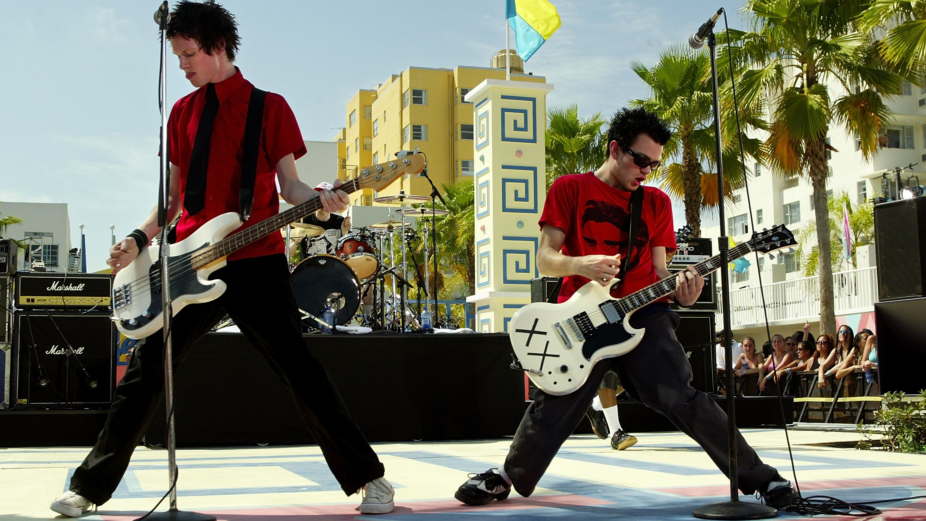 MIAMI BEACH, FL - MARCH 12: Pop punk band Sum 41 performs during a taping for "MTV Spring Break 2003" at the Surfcomber Hotel March 12, 2003 in Miami Beach, Florida. (Photo by Scott Gries/Getty Images)