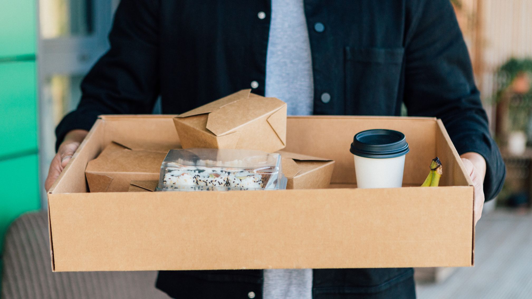 Man Delivering Food At The Front Door