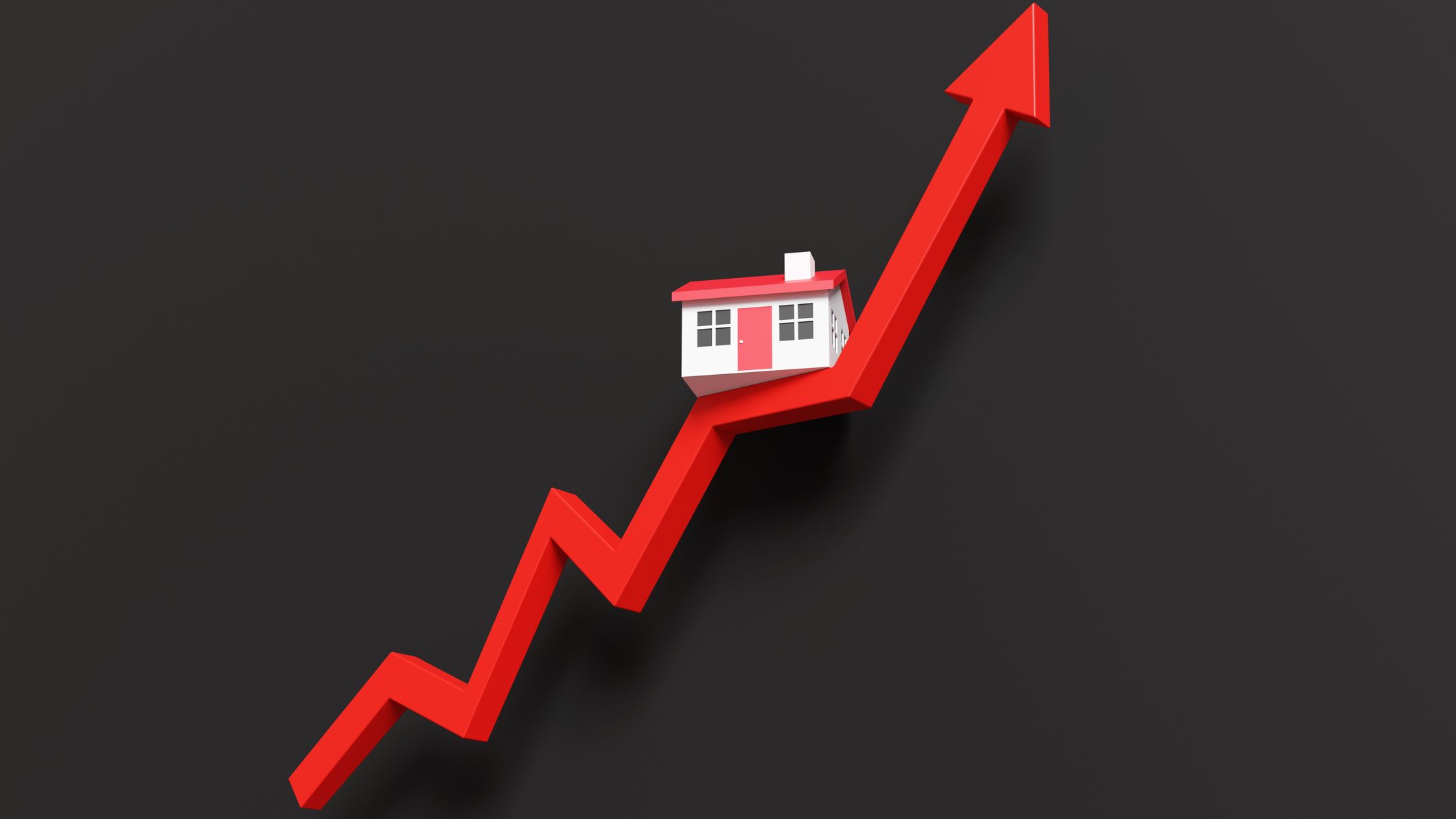 Toy house on a red up arrow on a black background.