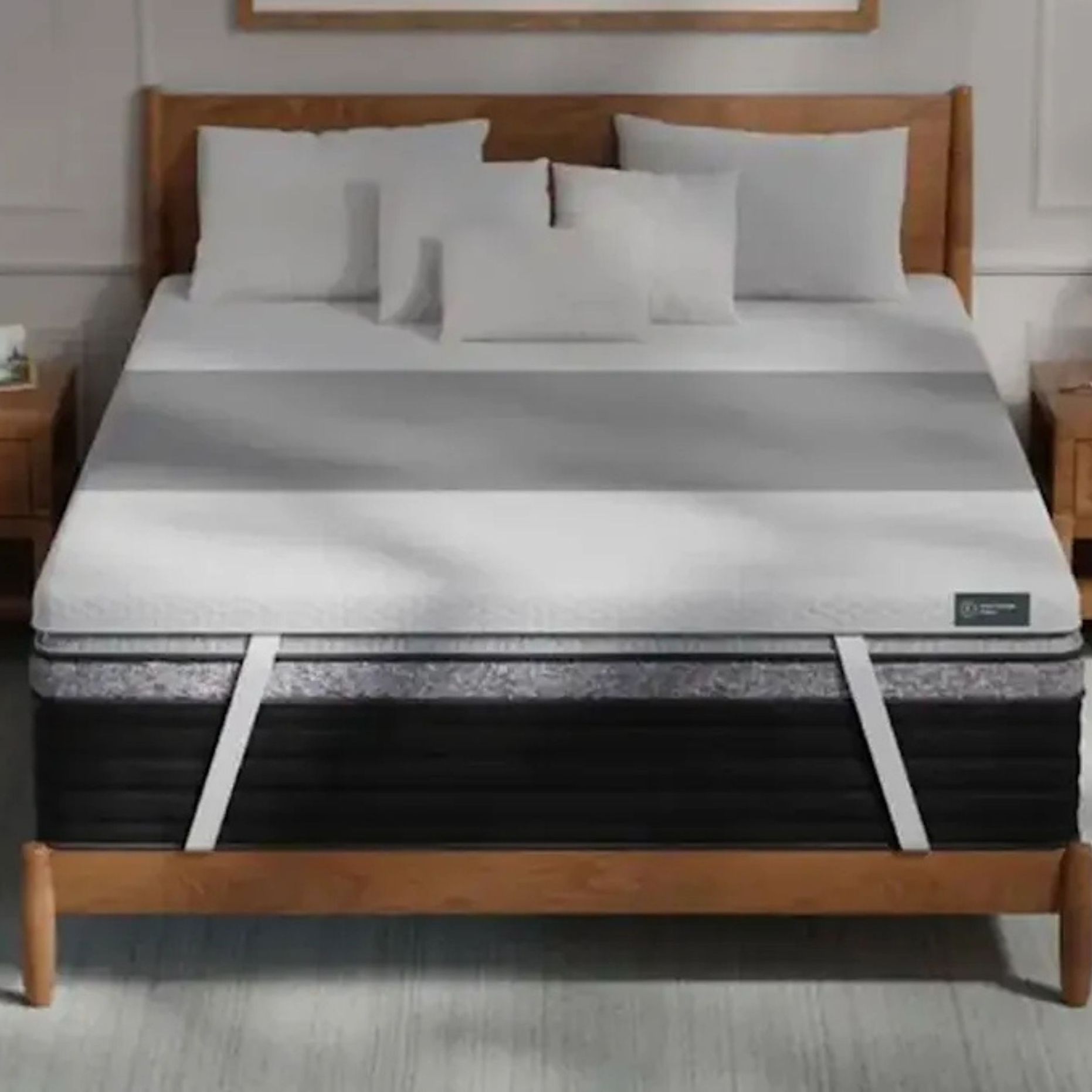 Helix ErgoAlign Mattress Topper on a bed against white walls.