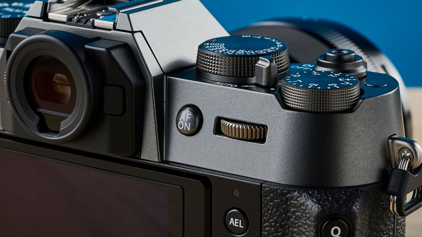 A Fujifilm X-T50 camera in the charcoal grey colorway