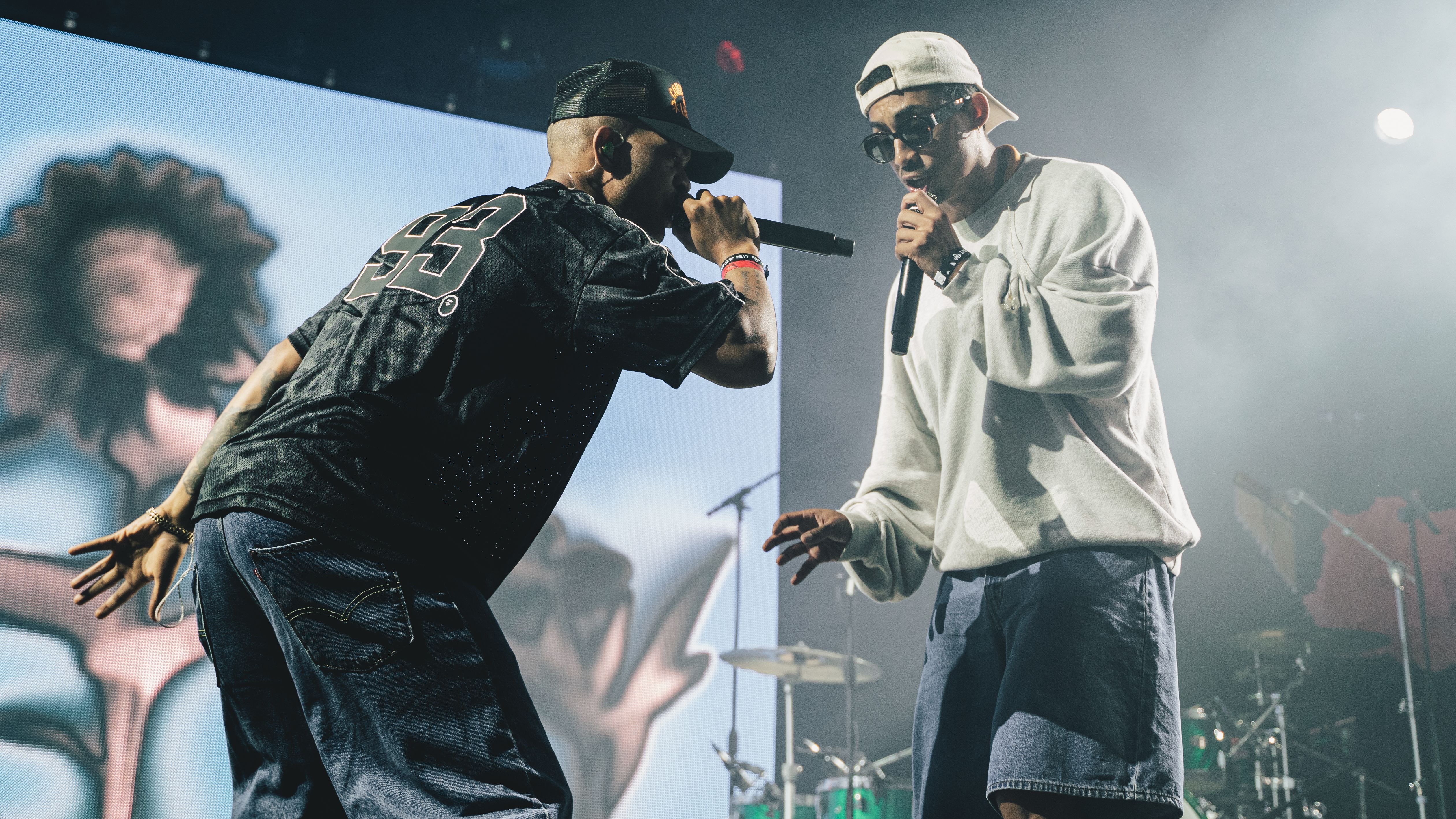 SHEFFIELD, ENGLAND - JULY 26: Harley Sylvester (L) and Jordan Stephens (R) of Rizzle Kicks perform onstage during Tramlines at Hillsborough Park on July 26, 2025 in Sheffield, England. (Photo by Luke Brennan/Getty Images)