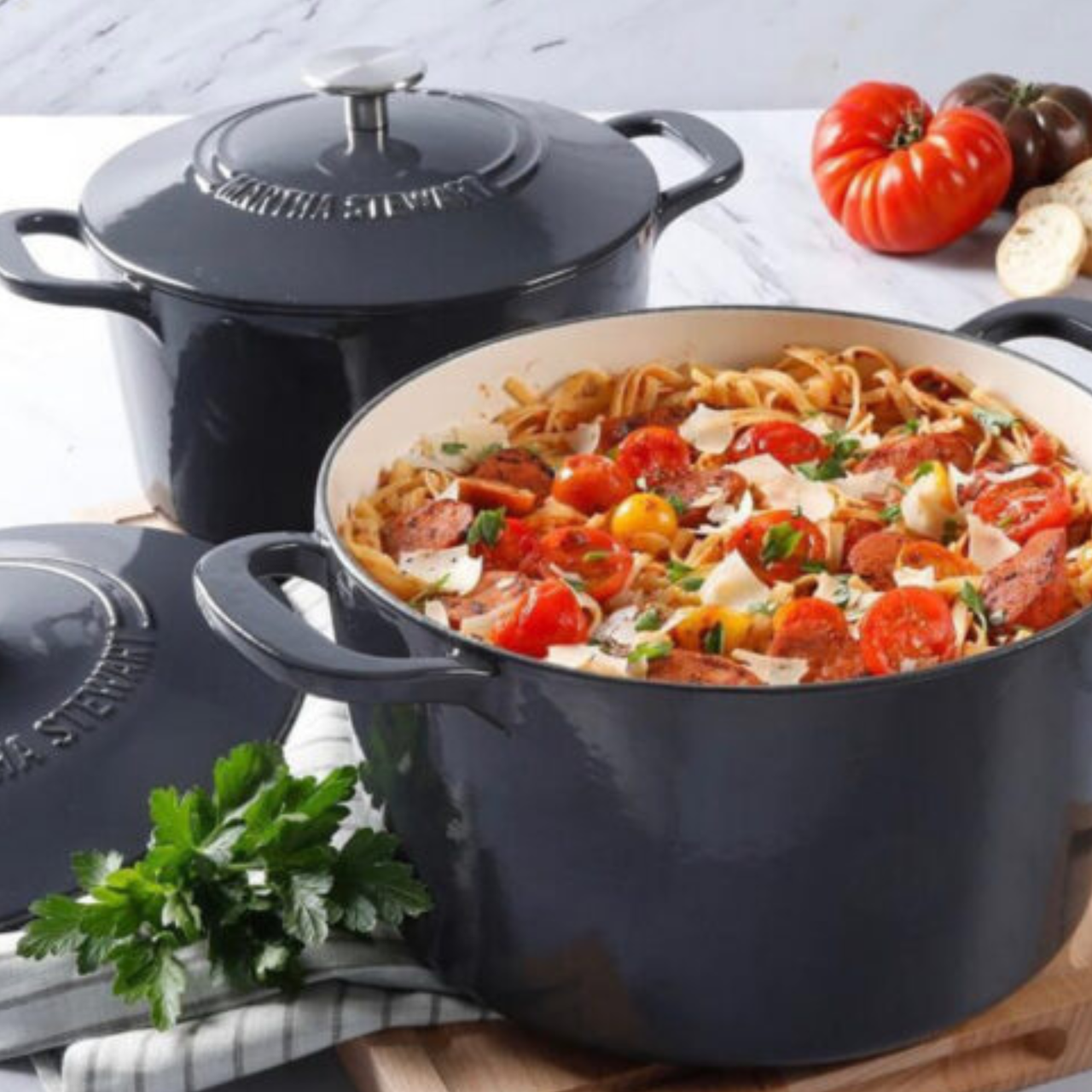Martha Stewart 7 Quart Enameled Cast Iron Dutch Oven in black filled with a one-pot pasta recipe