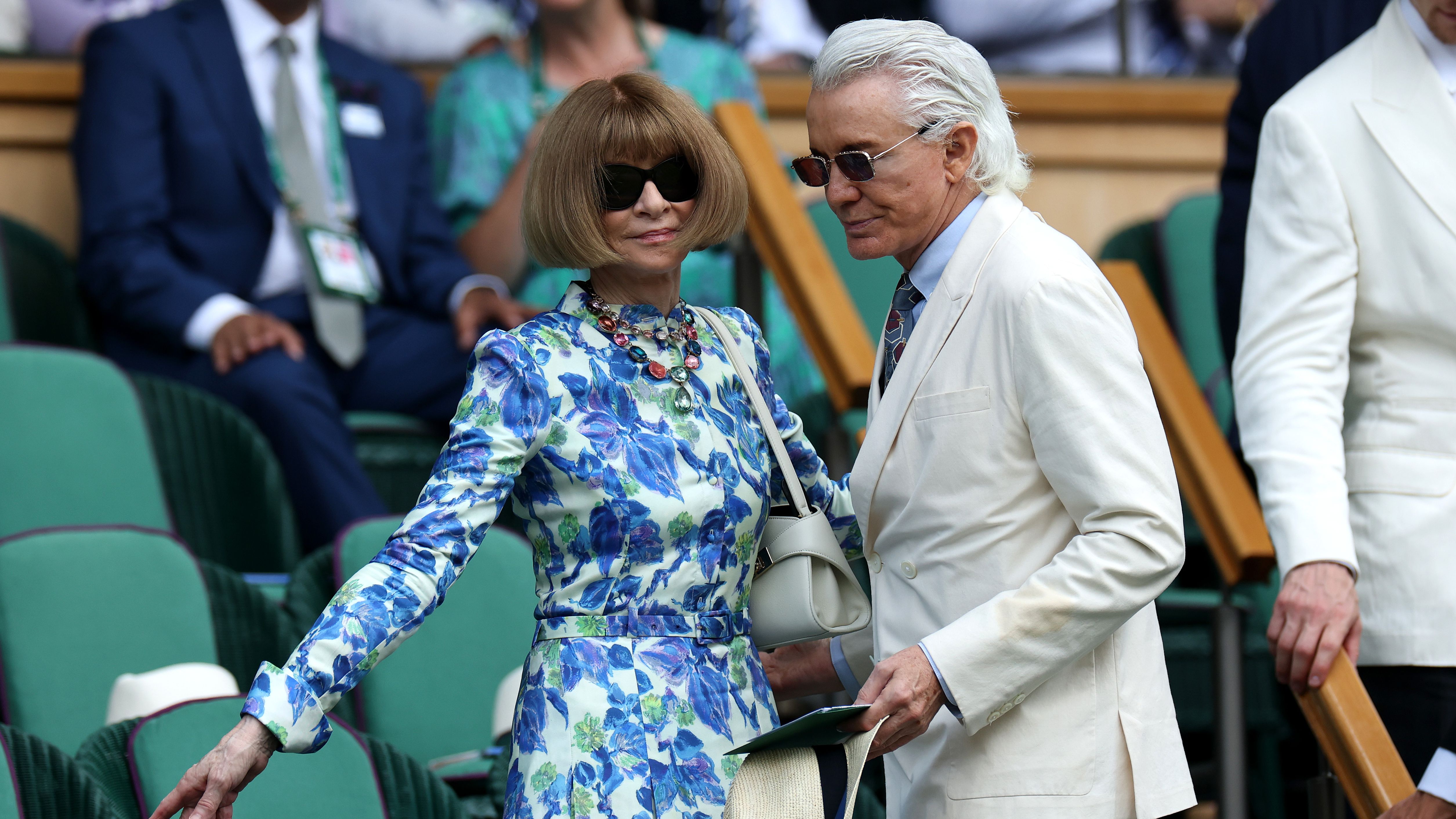 Anna Wintour and Baz Luhrmann in the stands at Wimbledon