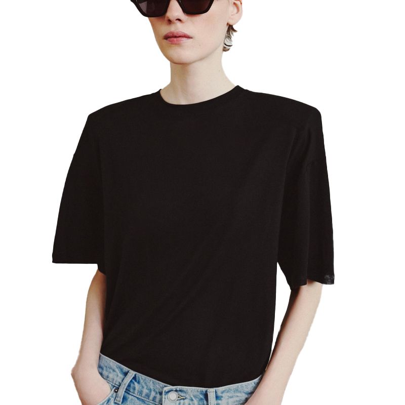 model wearing a shoulder pad top, Zara